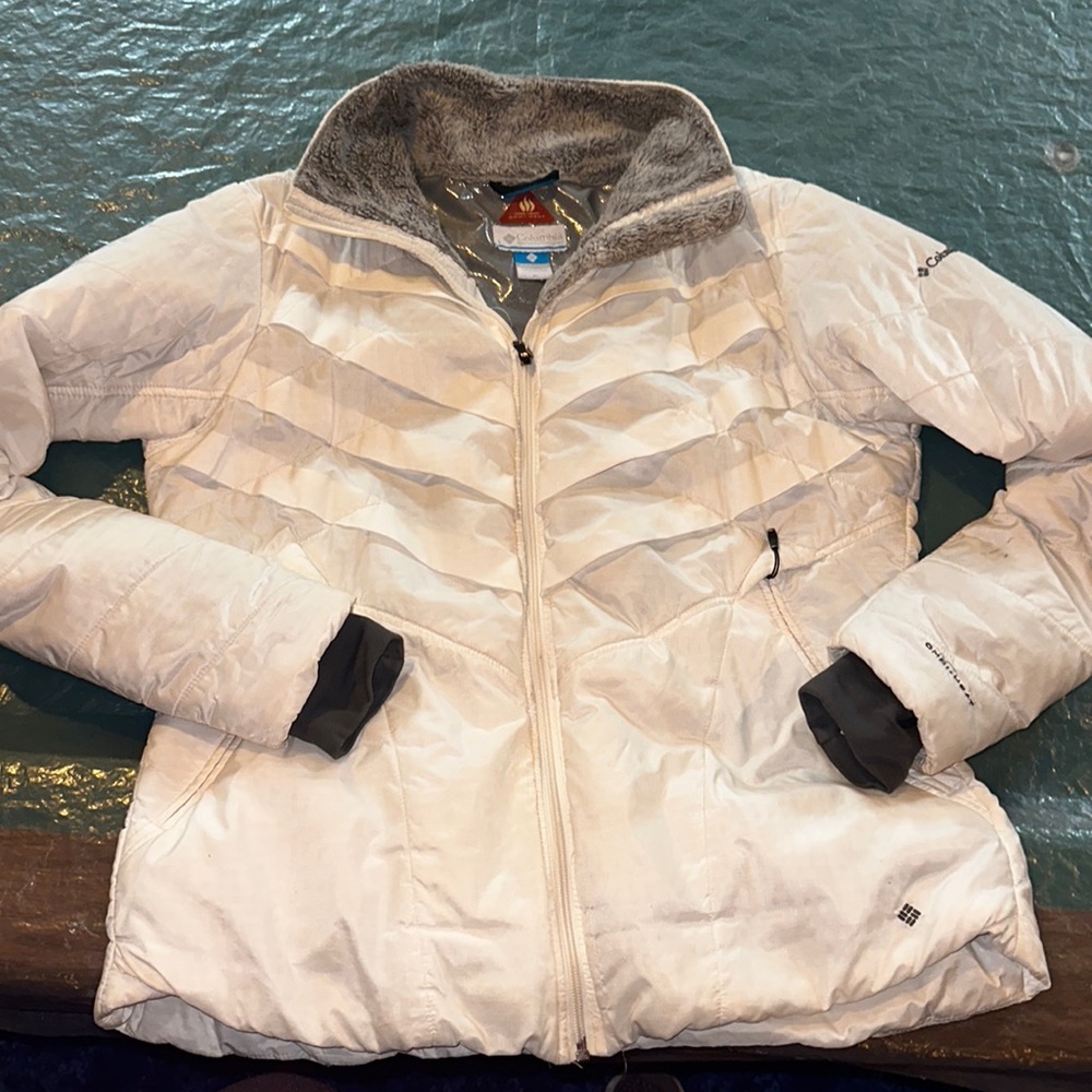 White and silver Columbia woman’s coat